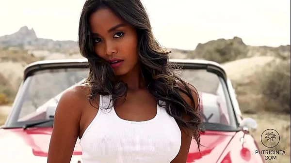 Asian Putri Cinta touching her round boobs and wet pussy