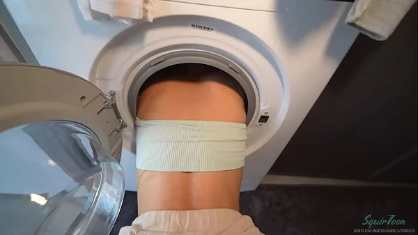 Juicy ass of my sexy young roommate sticks out of the washing machine and asks for a hard cock