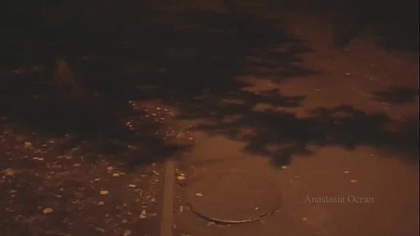 Naked woman walking on the city street in the early morning. Public.