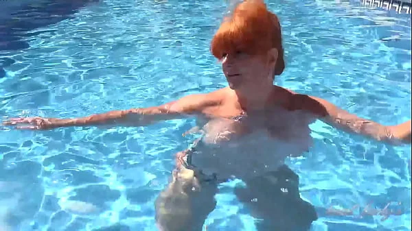 AuntJudys - Busty Mature Redhead Melanie goes for a swim