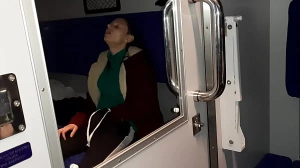 A stranger and a fellow traveler and I cum in a train compartment -