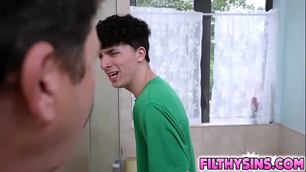 Stepmom Scarlett Venom enjoys riding her stepsons cock as he enjoys sucking her big tits