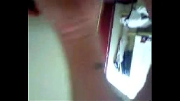 husband gives wife pearl necklace