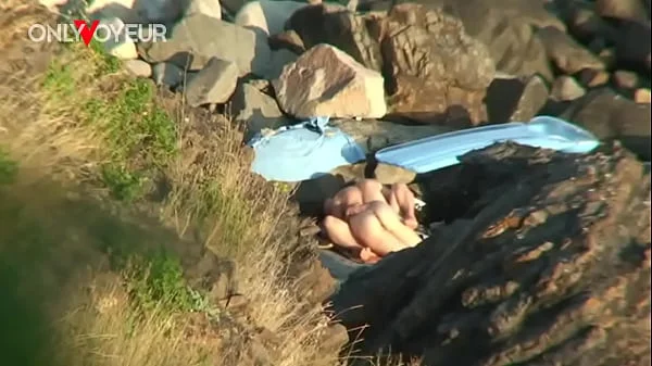 Beach Voyeur. They were thinking it is a secluded place for a quick fuck