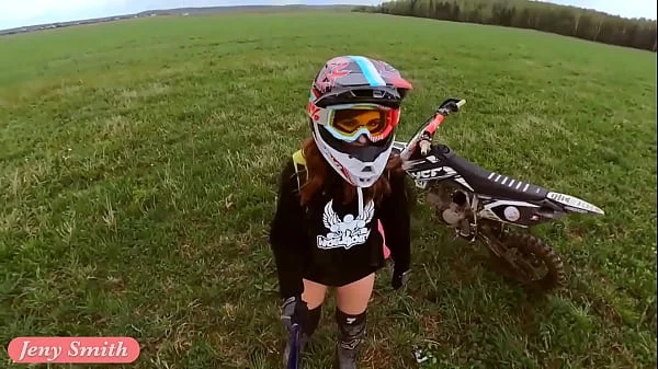 Naked woman riding a Dirt Bike