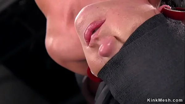 Tied up brunette anal fisted in dungeon