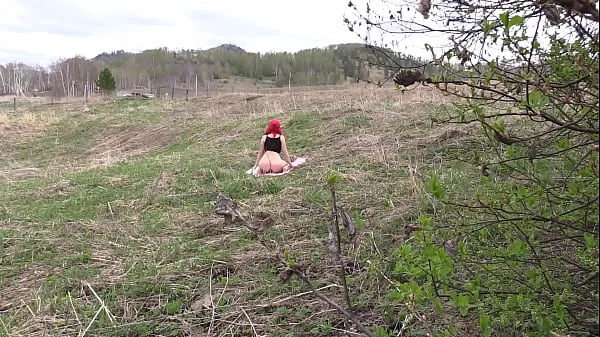 Voyeur spies on a girl with a big ass that masturbates outdoors. Organic masturbation with cucumber.