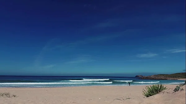 PISS PISS TRAVEL - Russian nudist girl Sasha Bikeyeva pissing on a public beach Doninos on Galicia Spain
