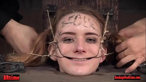 Bdsm babe trapped in a barrel and electrified