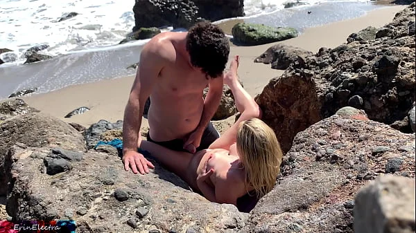 Voluptuous blonde sunbathing nude on the beach fucks passer-by - Erin Electra