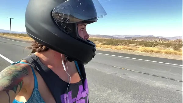 felicity feline riding on aprilia tuono motorcycle