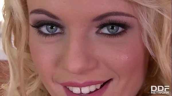 Blonde babe Vanda Lust fingers her wet shaved pussy on the bathroom floor