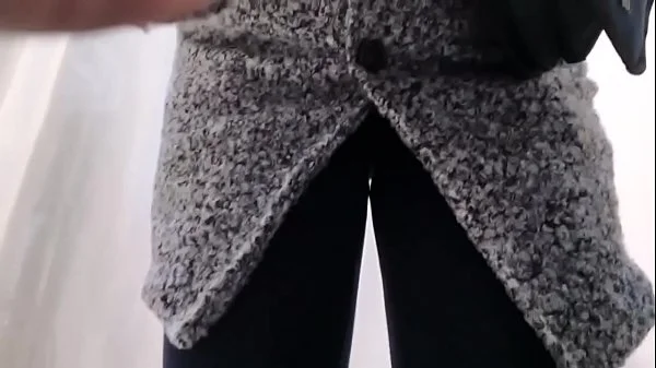 Your buy a new sweater but first squirts on her hands in a shop fitting room
