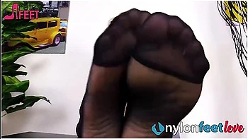 Brunette Spreads Her Toes In Nylons With Petra Feet
