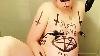 Satan slave takes an enema on Satan's orders