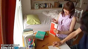 She spreads her legs with her fingers, and then he explains how to do it and then gives her cunnilingus.