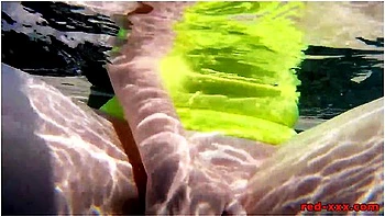 Red Xxx In Fucks Her Pussy With A Toy In The Pool