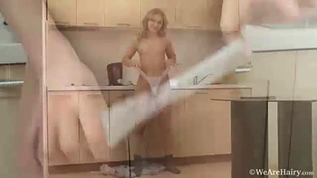 Nadin shows off sexy body in kitchen looking hot - WeAreHairy