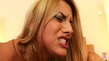 A Blonde In Leather Is Double Penetrated By A Man With A Strapon Until Cumshot