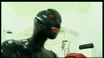 Humiliating pussy distress dildo sucking in masked, dominantrice in red latex dress