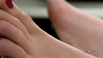 Hairy Jenna Brooke-Benjamin plays with food.