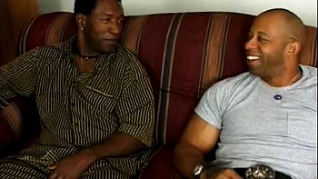 Blonde takes two massive black cocks