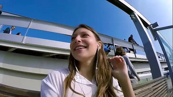 Talia Mint plays in public with remote control toy over the phone with fan