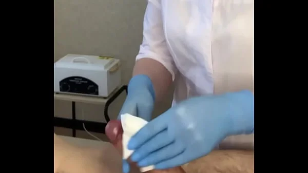 The patient CUM powerfully during the examination procedure in the doctor's hands