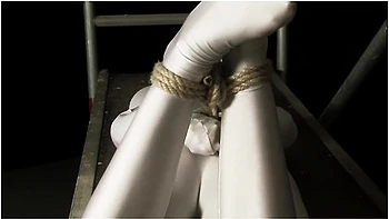 Babe Wrapped In White Zentai Suit Enjoys To Be Bondaged To A Metal Pole