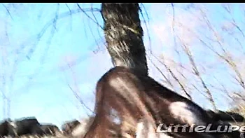 Lupe goes solo outdoors on the grass