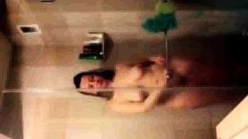 Spying on Stepmom showering and masturbating