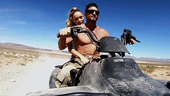 Outdoor action with tanned beauty Emma Hix and her impressive assets