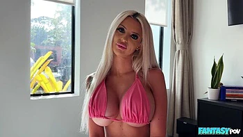 Silicone-boobed blonde Mckala Noel is playing with a big cock