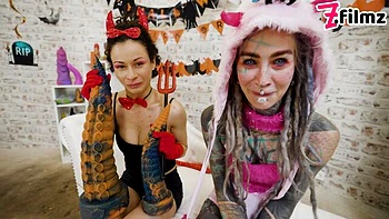 Tattooed girlfriend Anuskatzz and Stacy Bloom are enjoying their toys