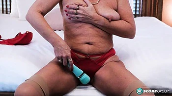 Soloing blonde Constance Joy is touching her wet shaved pussy