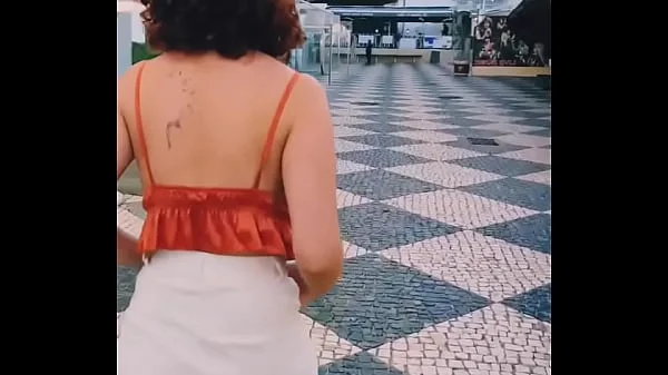 walking around with a dildo in her pussy