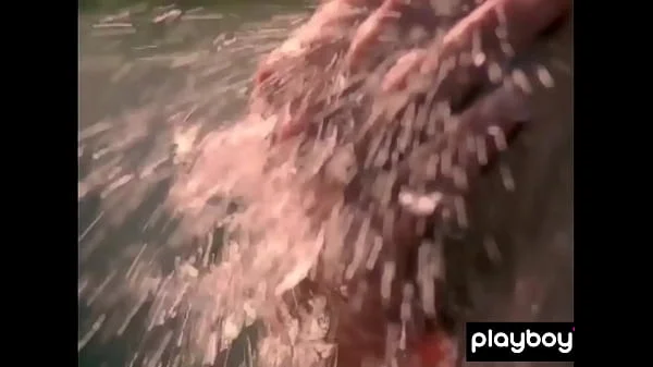 Big boobed blondie Kimberly Holland taking off her sexy uniform outdoor