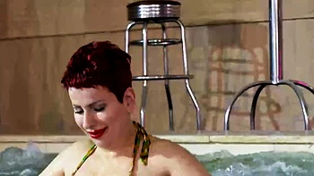 Busty MILF Lisa Pinelli in an Intimate Solo Scene