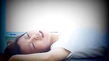 She inserts and removes the vibrator, gives a blowjob, and shakes her hips in the cowgirl position.