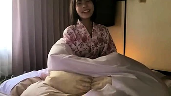 Lovely small titted brunette fingering her pussy