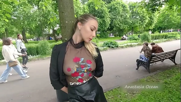 Public walk in transparent t-shirt in peak hour