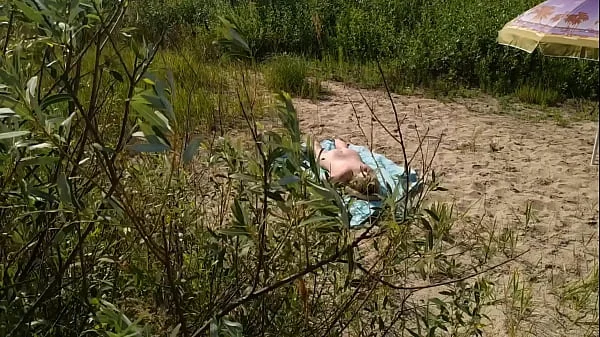 Big Dick Guy Jerks Cock Near Sunbathing Nude Beach Big Boobs Milf and He Massive Cumshot Near Her Body