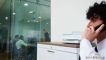 Redhead MILF Gets Double Blowjob and Handjob in Office