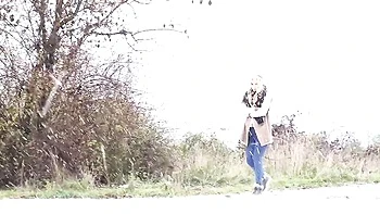 Outdoor solo pissing with a long-haired blonde Bianca Ferrera