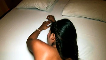 Thai bar girl waiting for instructions from Farang customer